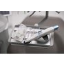 TRIOS6_scanner_close_up_with_ready_tip_on_tray_2025_HIGH.jpg